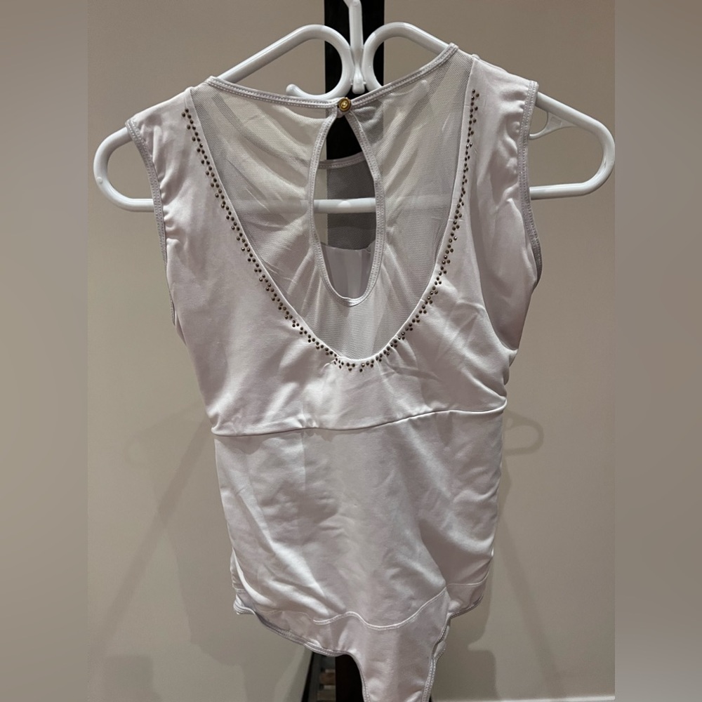 Faja shirt and workout tights from Colombia.Plus green semi casual shirt size M.